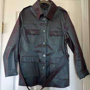 Samuel Dong. Woman’s long sleeve with belt, button-down dress jacket.